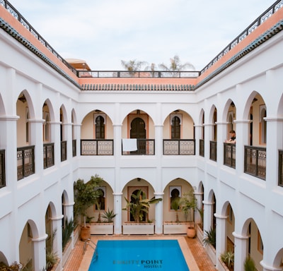 pool on the middle of 2-storey building