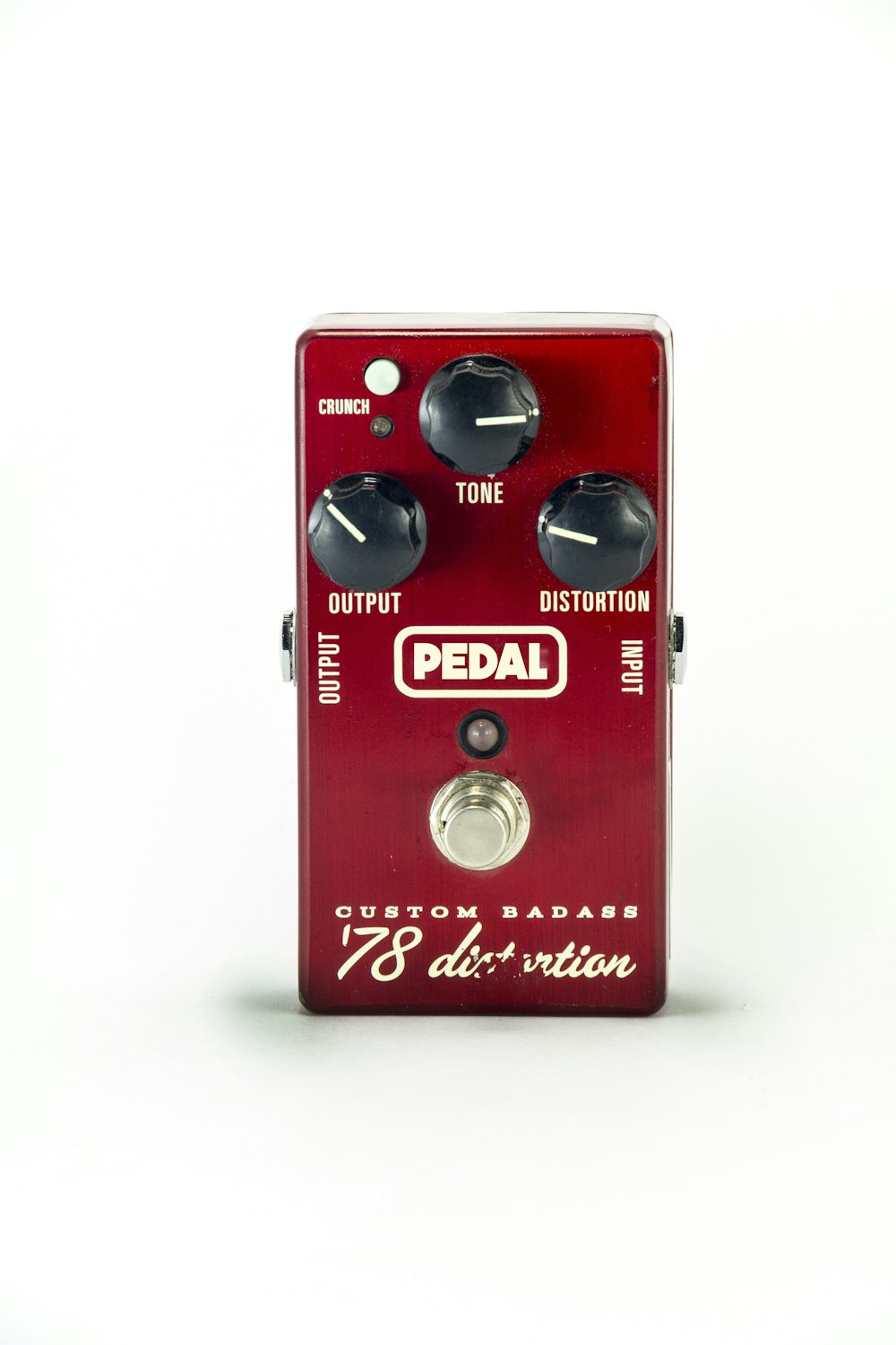 red, white, and black Pedal guitar distortion pedal