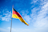 blue, red, and yellow flag