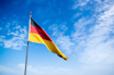 blue, red, and yellow flag