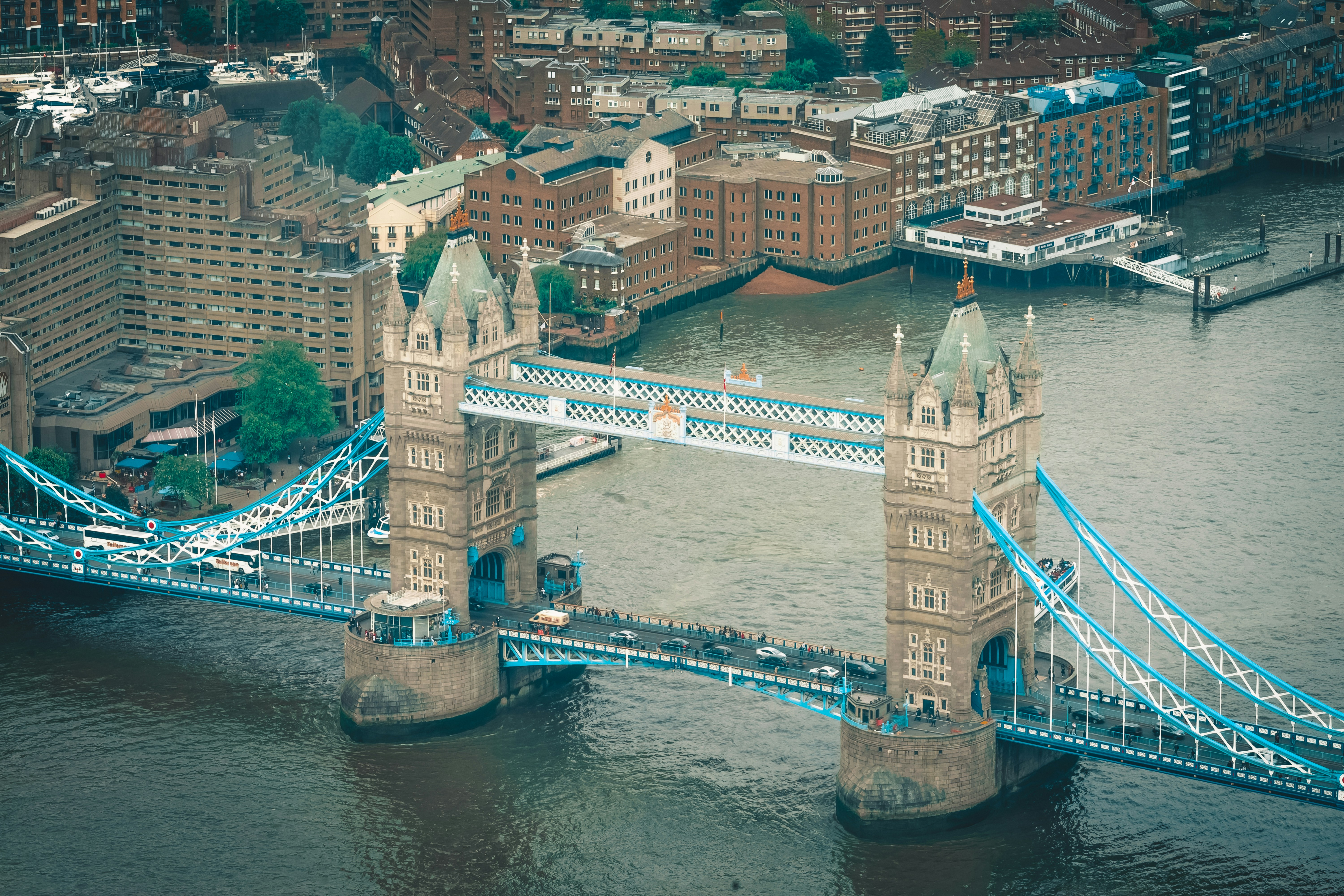 Seen from the nearby Te Shard, from its 72nd floor, the Tower Bridge of London, on a rainy day.