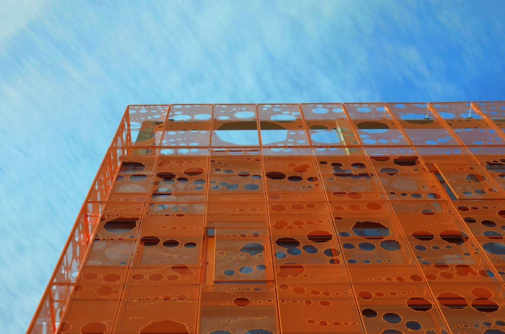 low-angle photography of orange structure