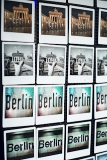 A grid of photos displaying various views and artistic representations of Berlin, including images of the Brandenburg Gate in color and black and white, as well as stylized text images of the word 'Berlin'.
