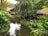 A modern septic system installation in a lush tropical setting, showcasing eco-friendly technology in a serene environment.