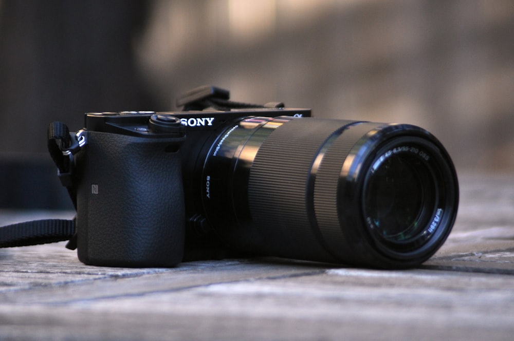 selective focus photography of Sony DSLR camera