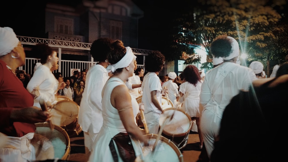 people parade during nighttime