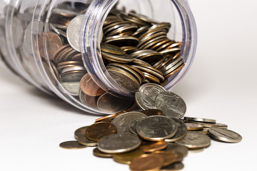 coin lot on glass jar