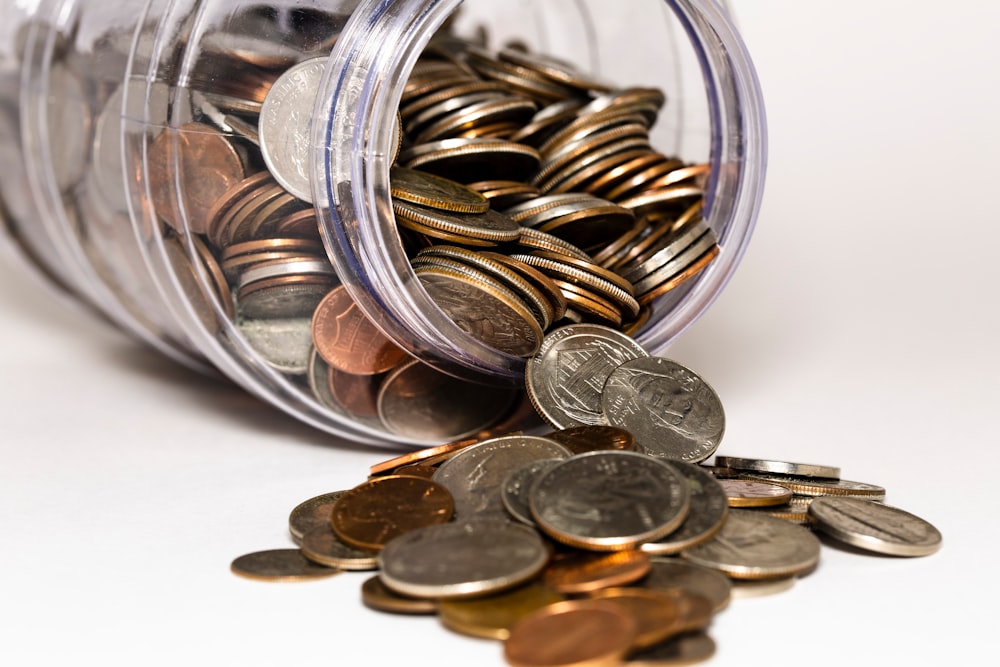 coin lot on glass jar