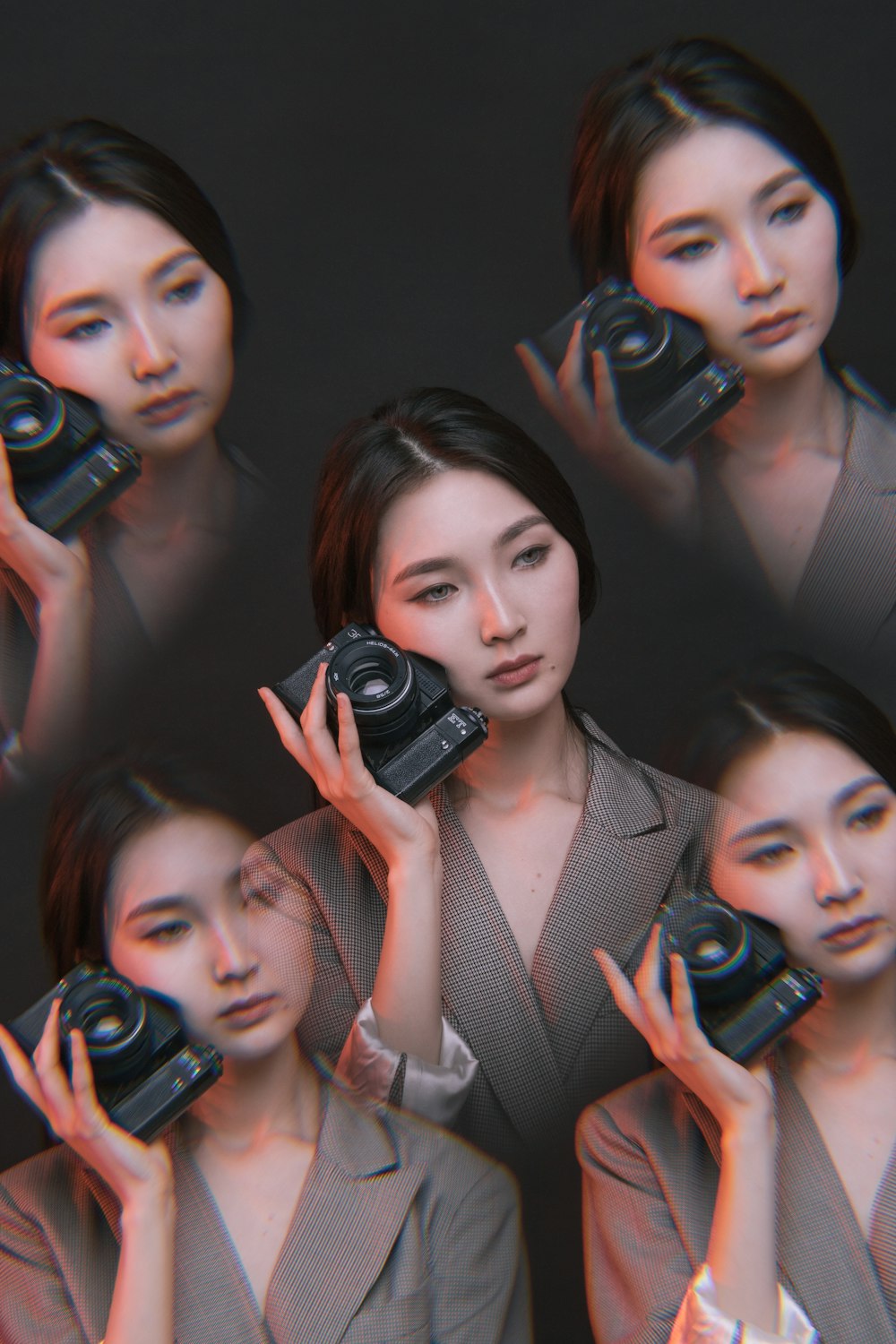 edited photo of woman holding black DSLR camera