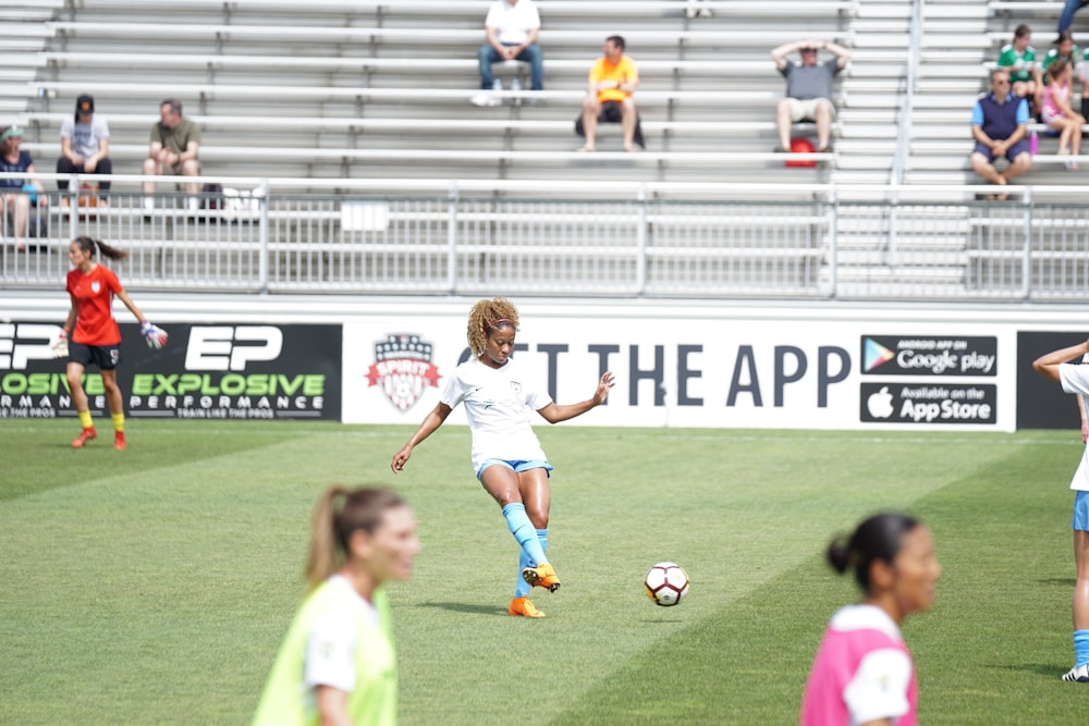 woman playing soccer