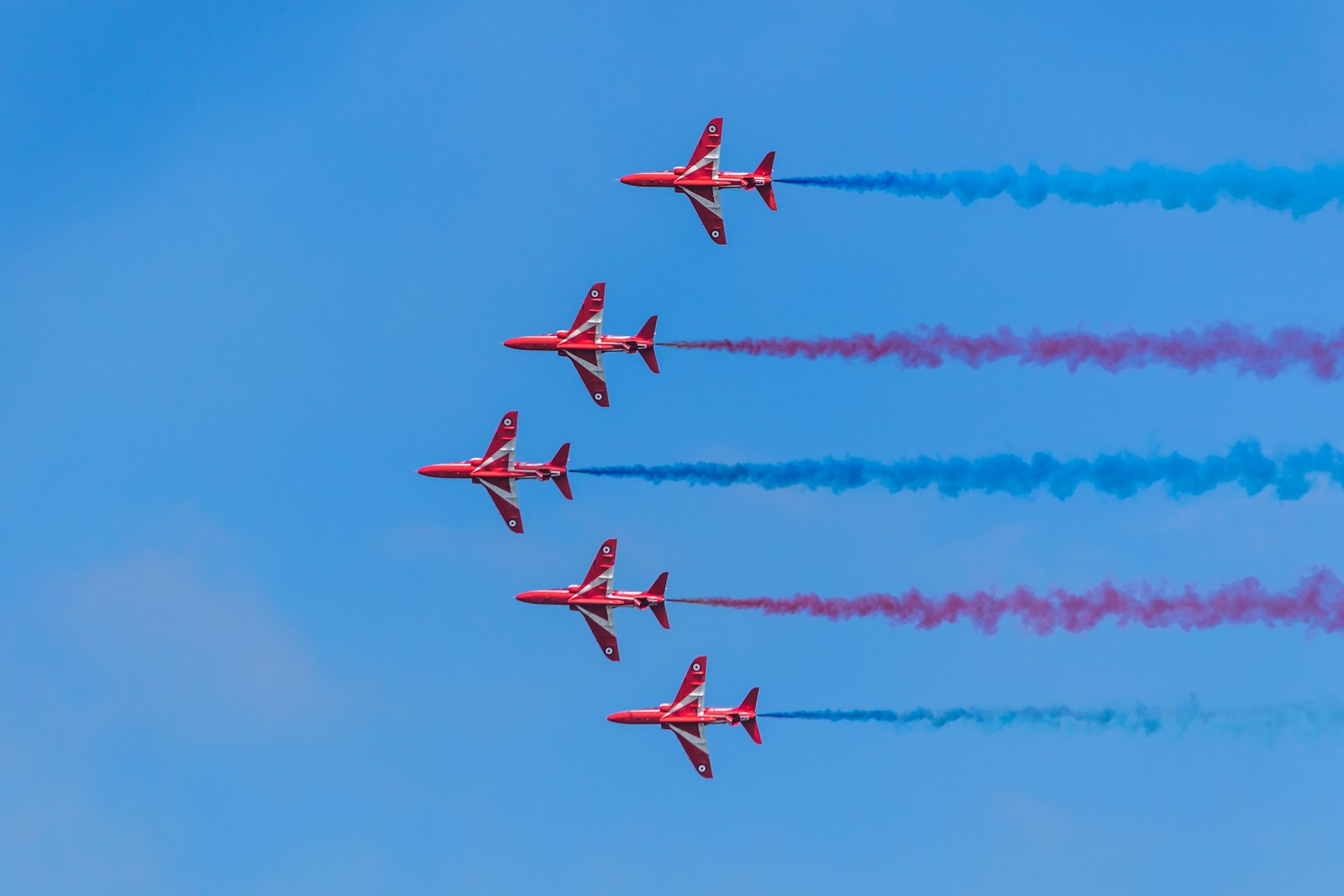 Canon EOS 7D Mark II + Canon EF-S 55-250mm F4-5.6 IS II sample photo. Five red planes in photography