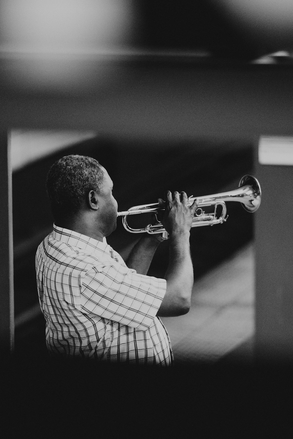 man playing trumpet