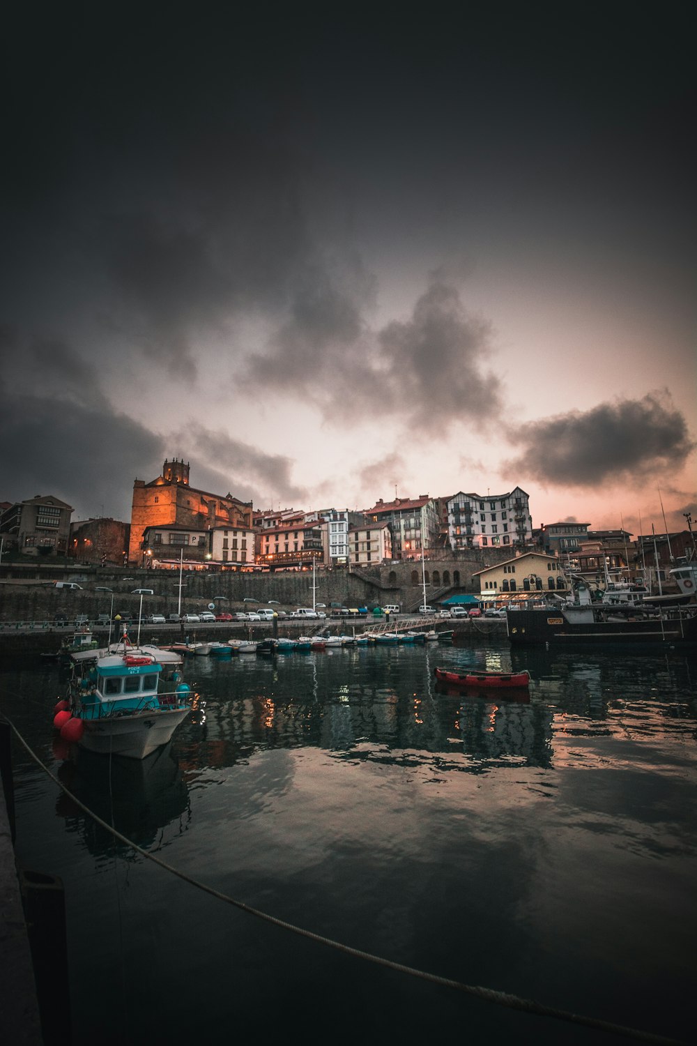 landscape photography of house and boat