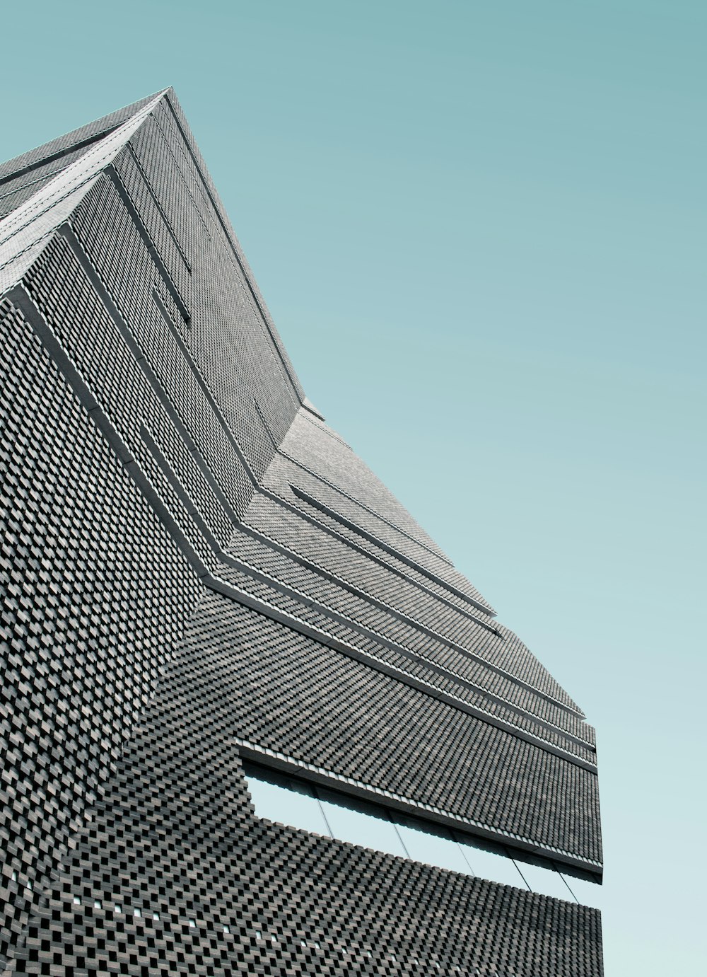 low angle photo of curtain wall building