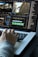 person using MacBook pro turned on