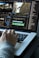 person using MacBook pro turned on