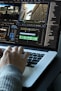 person using MacBook pro turned on