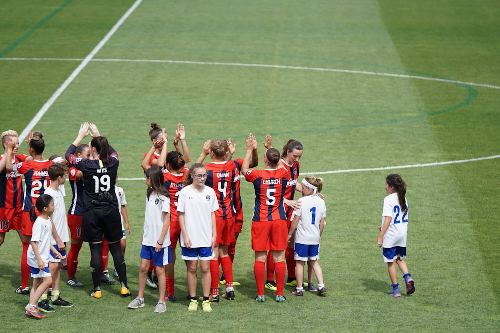 soccer players on field