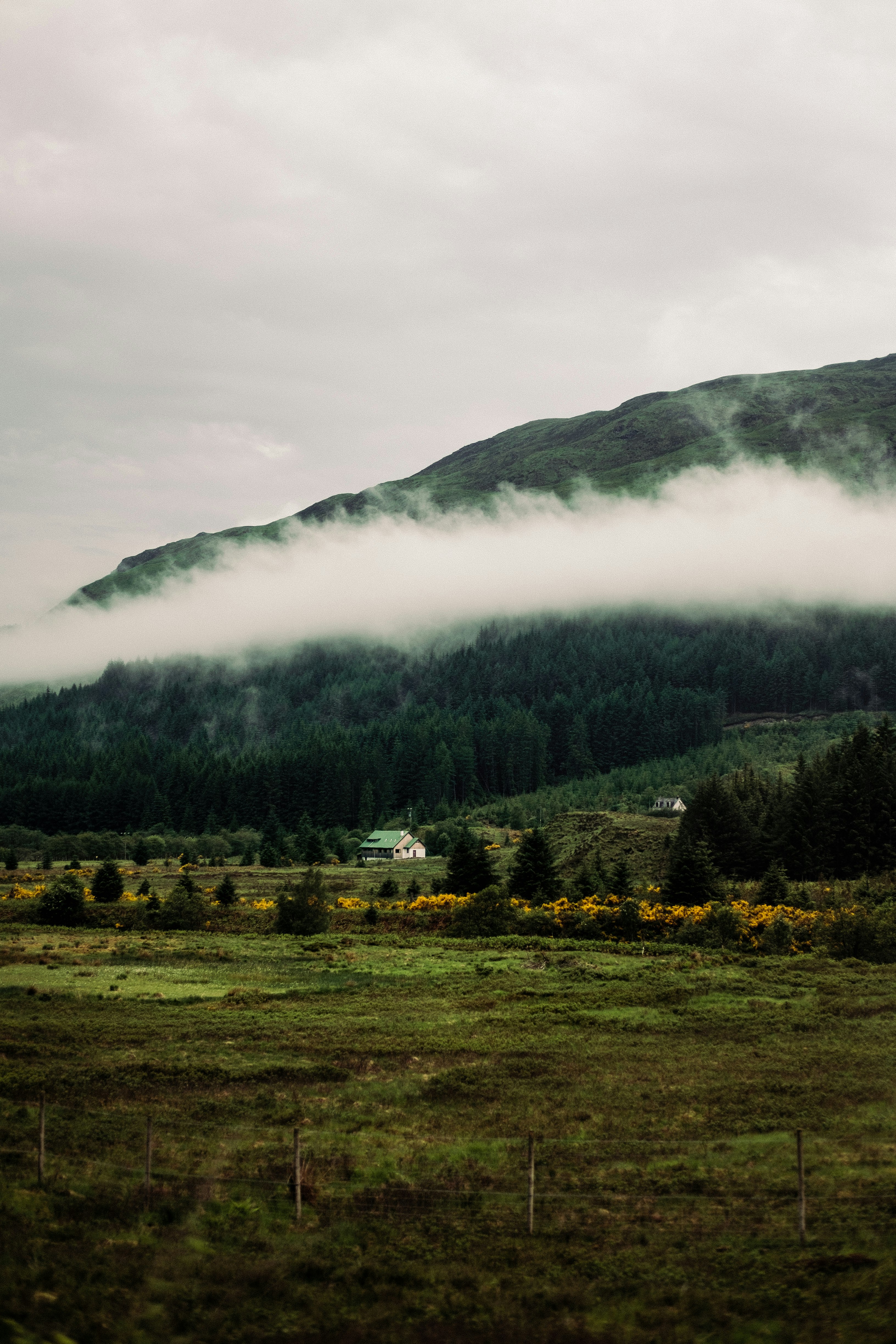 Travelling up north to Fort William for the mountain biking downhill World Cup. It was early, the roads were clear and the weather was patchy and wet every so often. The low cloud produced some beautiful views from the car, the small cabins every so often gave us a real sense of scale with our surroundings. Like so…