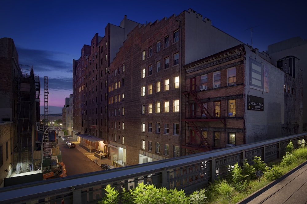 gray and brown concrete high-rise building