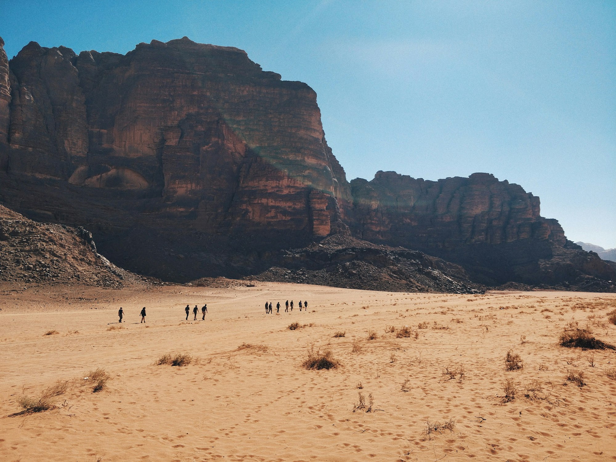 This photo was taken in late 2017, in the Wadi Rum desert in Jordan – the most beautiful place I have ever been. The immense mountains and orange sand contrasting with the blue sky. A truly remarkable sight.