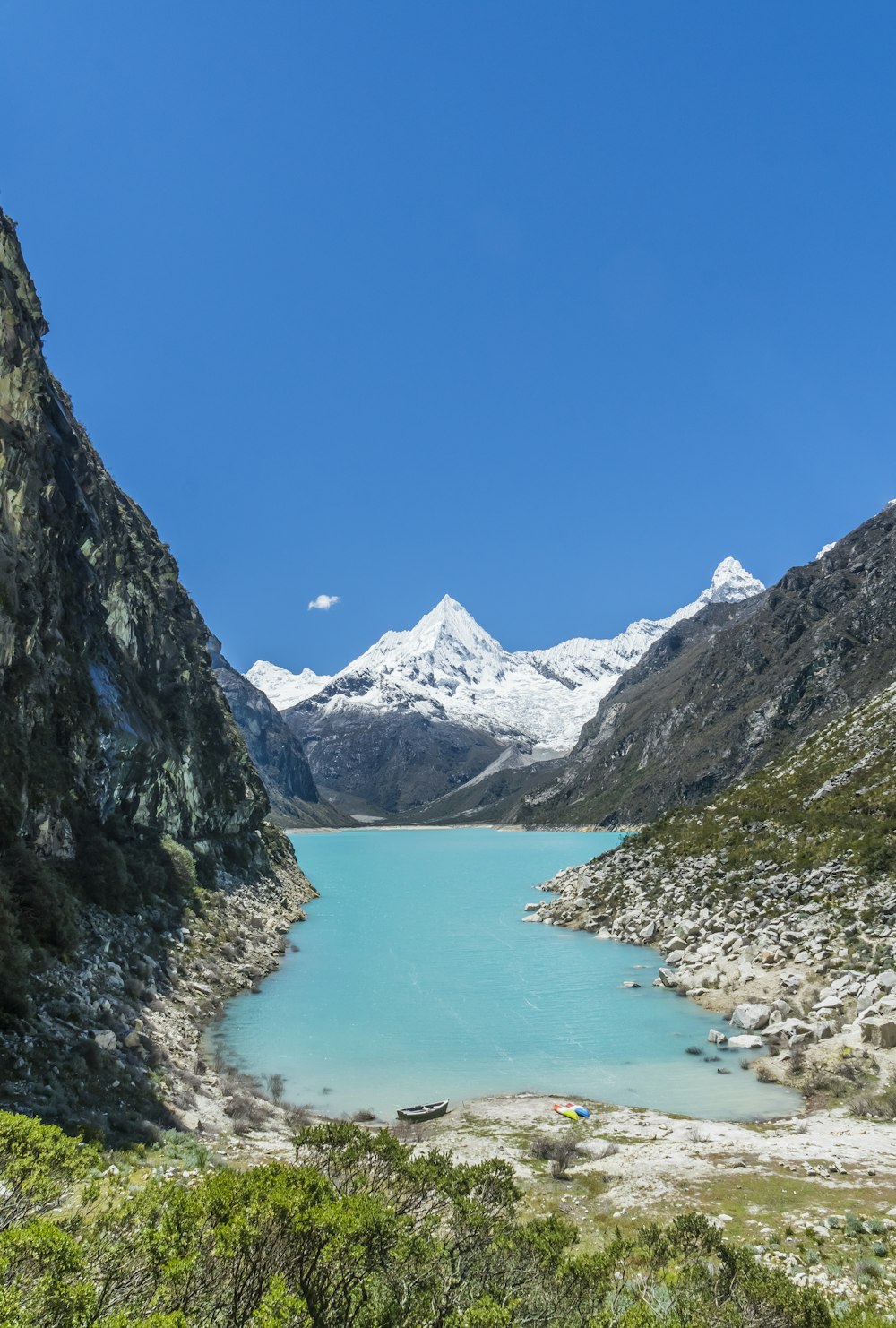 body of water surrounded by mountains