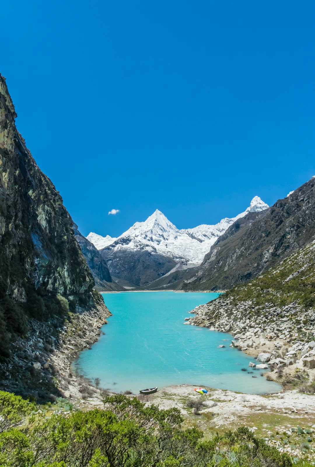 body of water surrounded by mountains