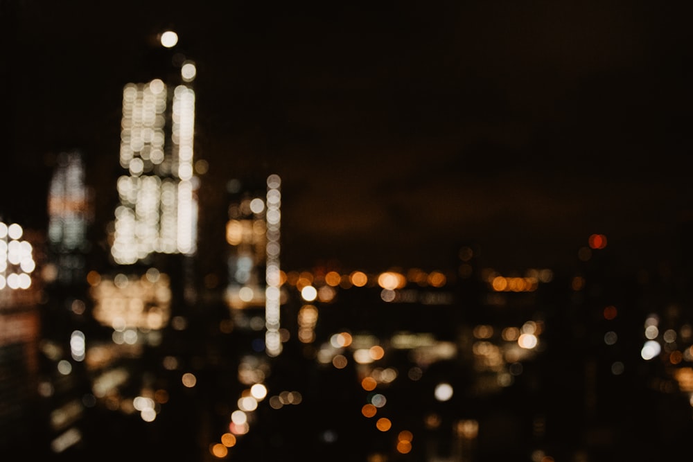 a blurry photo of a city at night