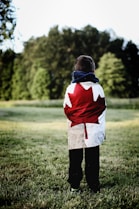child wearing Canada flag