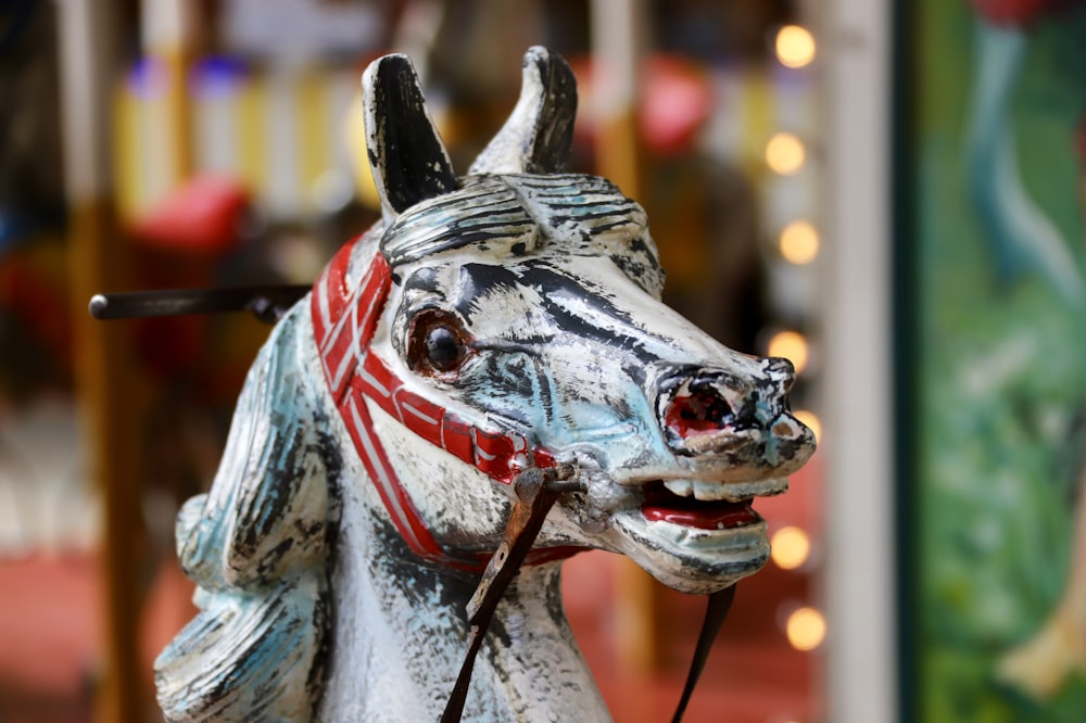 white and gray horse figurine