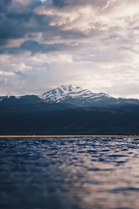 snow-covered mountain under cloudy sky in Bridgeport United States