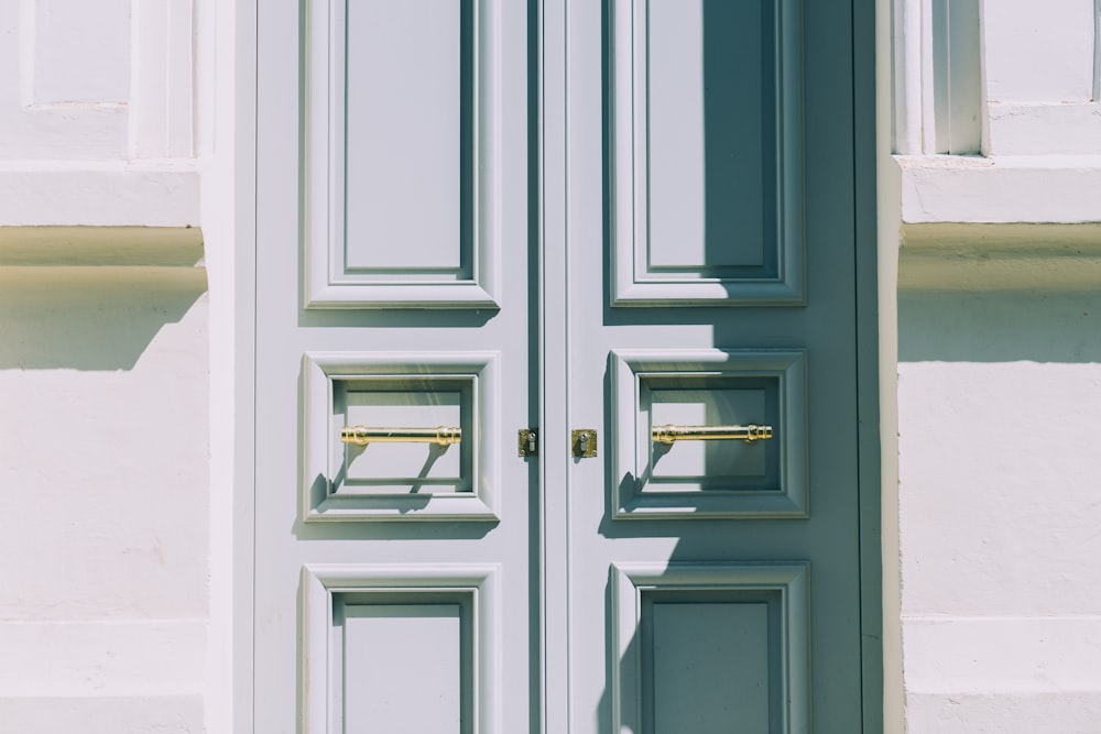 two white wooden doors