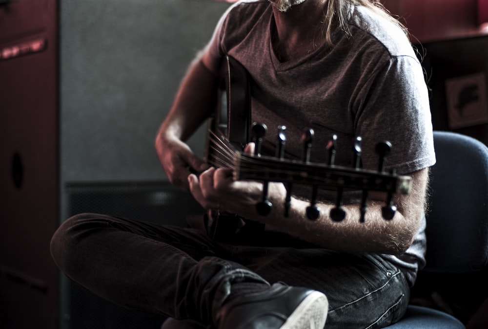 man playing guitar