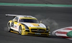 white and yellow mercedes race car