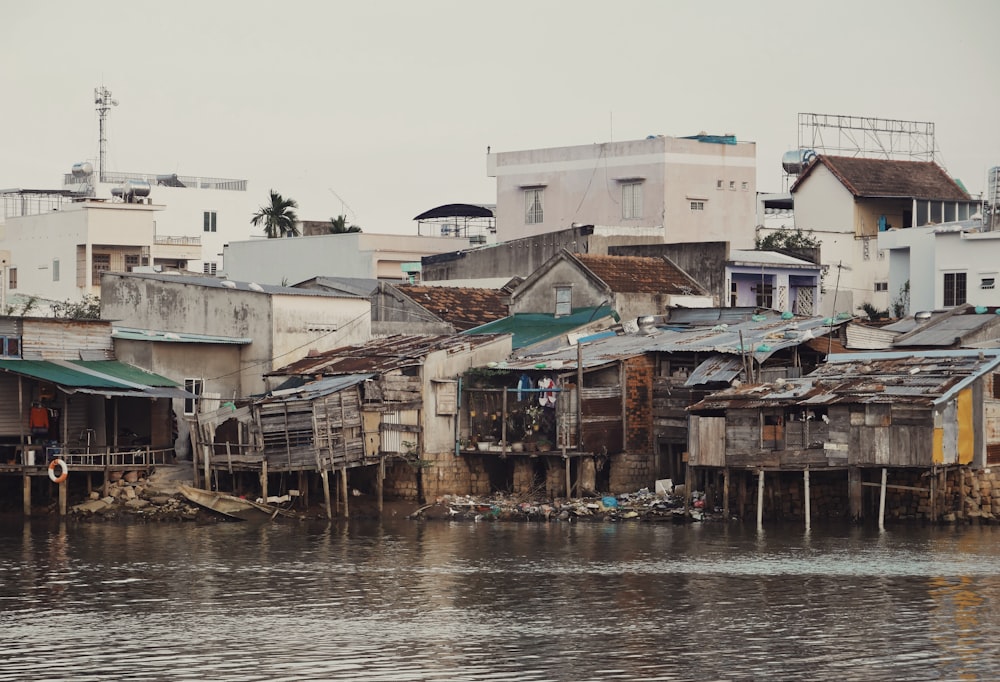 photo of houses near body of water