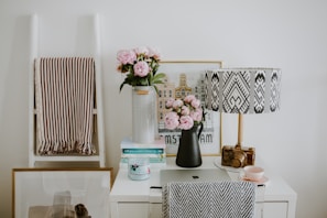 black and white table lamp on white wooden table