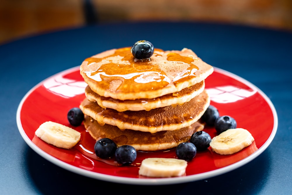 baked pancake with blueberry and slice of banan