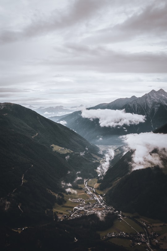 bird's eye view of city surrounded by mountains in Ahrntal Italy