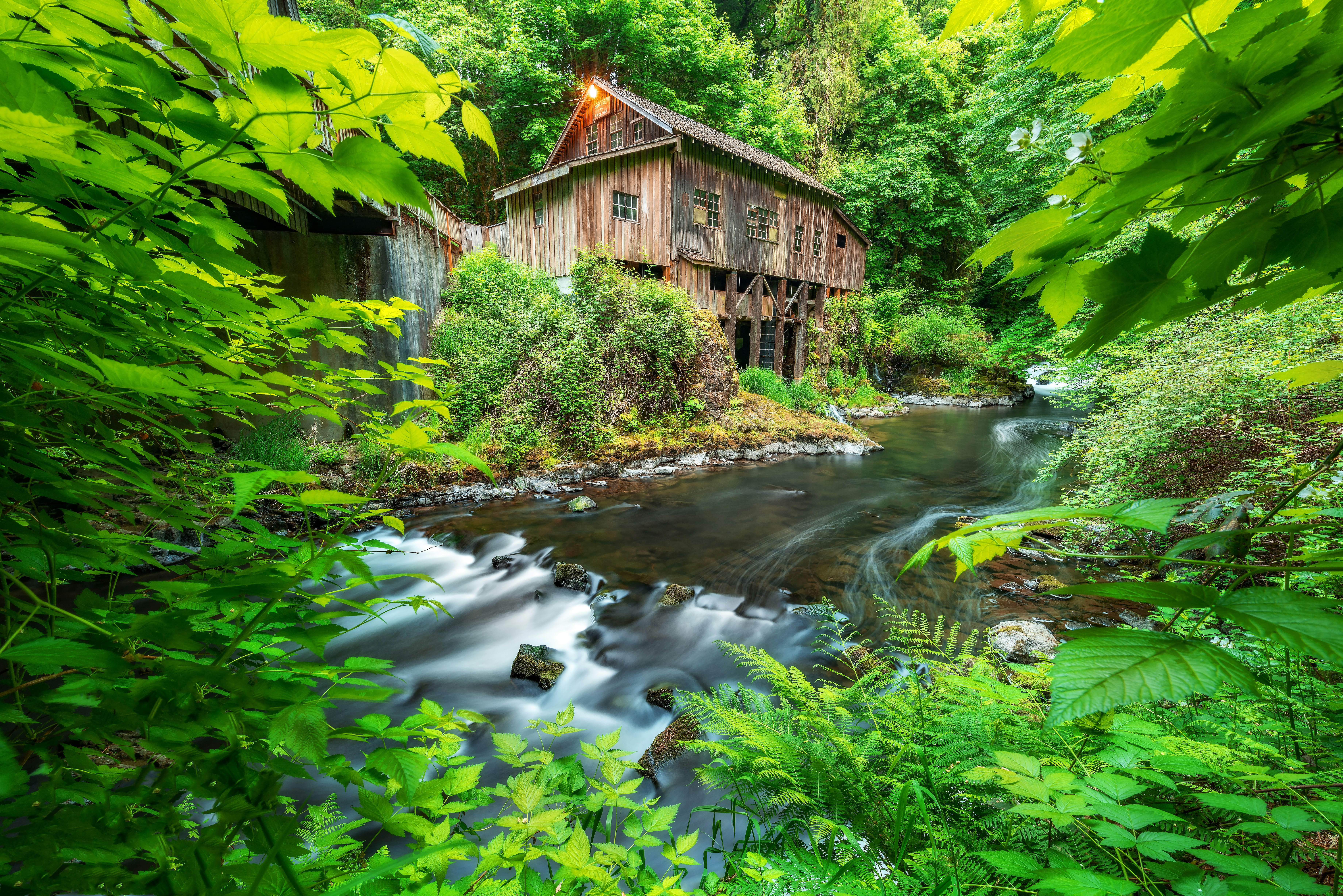 The Cedar Creek Grist Mill is a historical grist mill located in Woodland, Washington listed on the National Register of Historic Places. The mill was built in 1876 by George W. Woodham family and A.C. Reid.