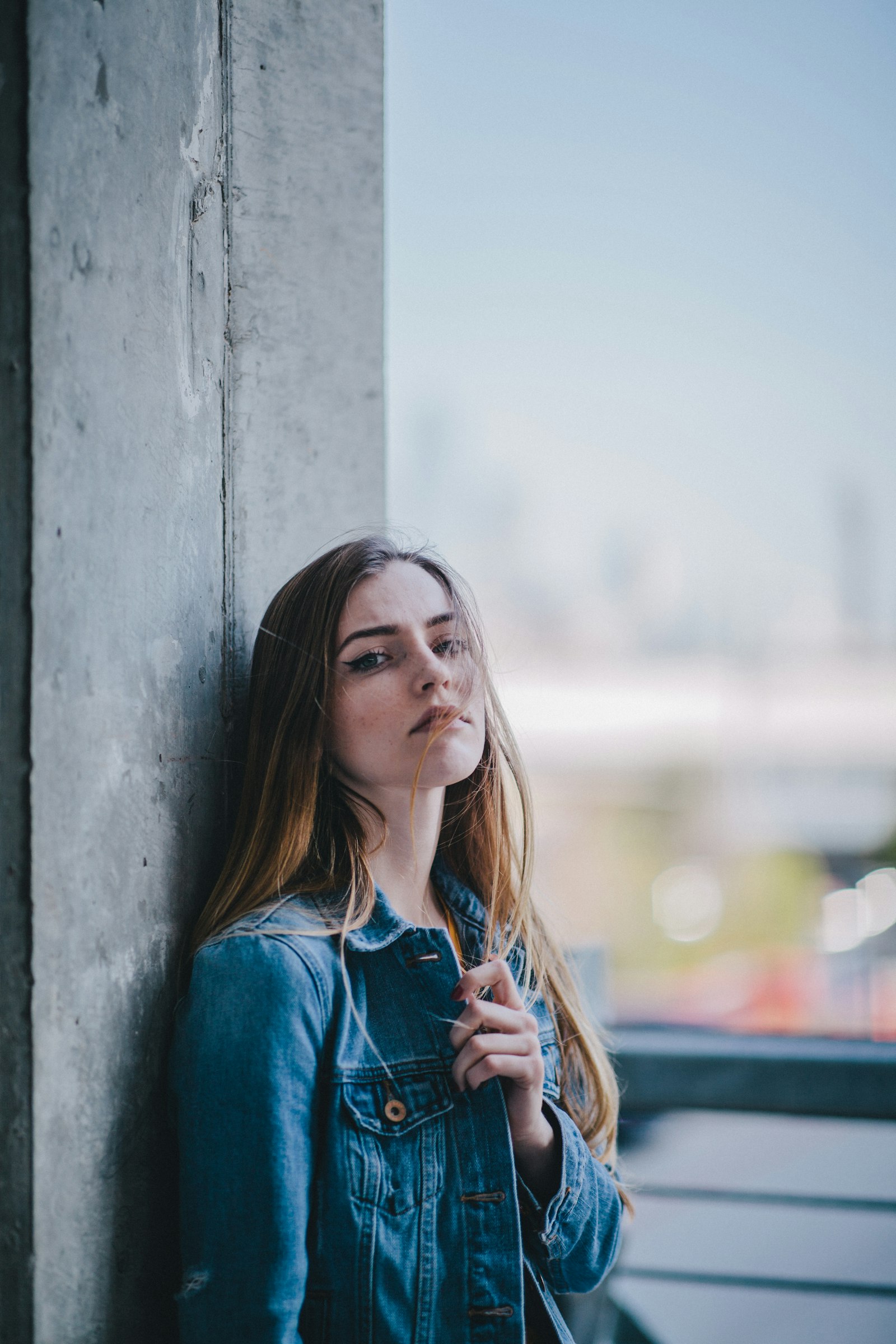 Canon EF 85mm F1.4L IS USM sample photo. Woman in blue denim photography