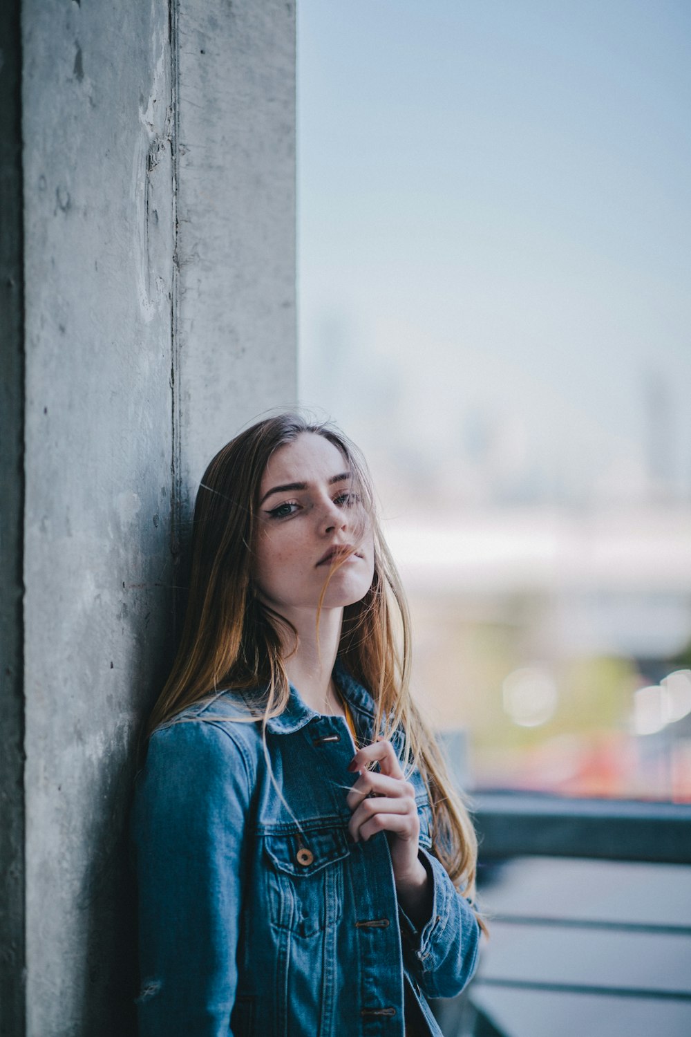 woman in blue denim jacket