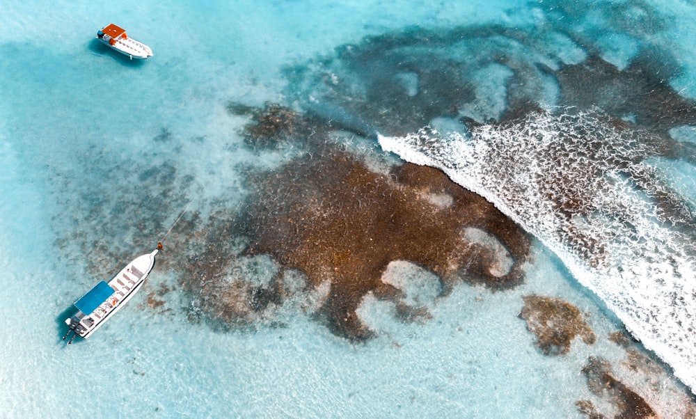 aerial photography of boats on water