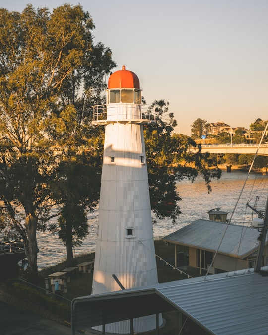 lighthouse beside house during daytime in Brisbane City Australia