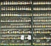 assorted labeled bottle on display shelf