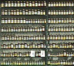 assorted labeled bottle on display shelf