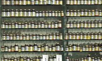 assorted labeled bottle on display shelf