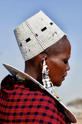 selective focus photography of woman wearing traditional dress
