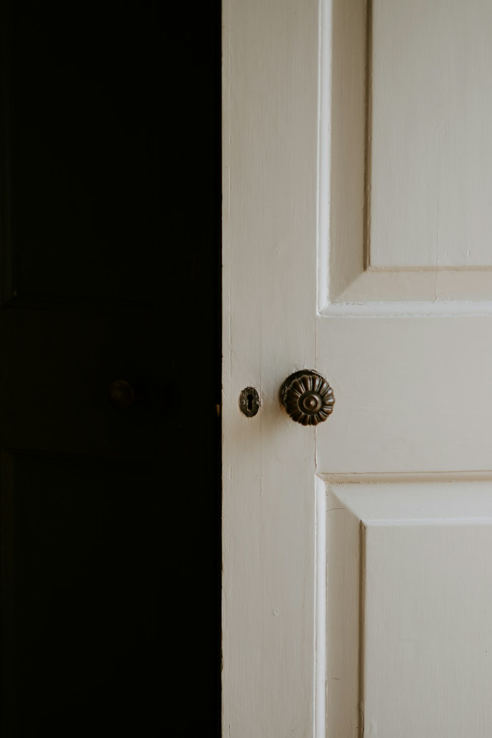 opened white wooden door