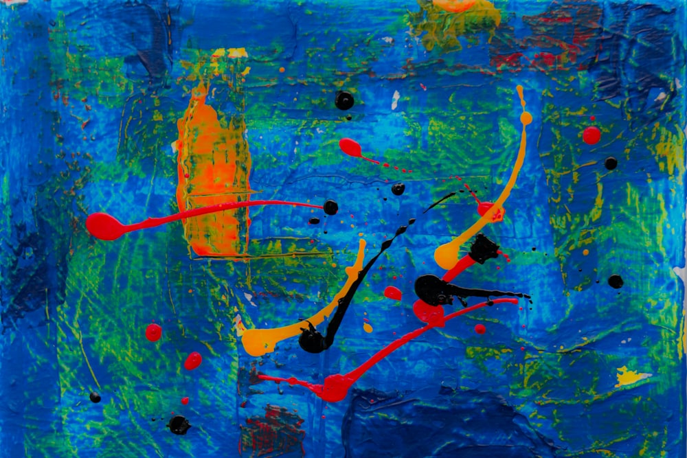 pintura abstracta azul, roja y amarilla