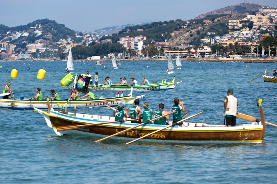 group of people riding boat at day time